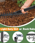 Person using a light duty dirt or rock rake with black handle and metal tines on mulch.