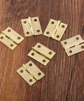 20 Pack Decorative Jewelry Box Hinges For Small Wood Boxes 18x16mm Mini Cabinet Hinges on wooden surface