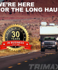 Trimax 30 years in business badge and RV on desert road with 'We're Here for the Long Haul' text