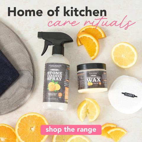 Soapstone and Concrete Countertop Wax 6 oz Orange Lemon Scent with Carnauba and Beeswax That Builds a Non Greasy Protective Barrier Against Stains and Spills on Stone Slate Concrete and Butcher Block Surfaces jar with citrus slices