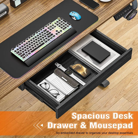 Electric Standing Computer Desk With RGB Lighting And Drawers For Home Office Gaming Setup showing spacious drawer with organization.