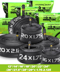 Assorted bike inner tubes with 35mm Schrader valves in various sizes, including Dual Pack 26x2.125 To 2.40 Inches with tire levers.