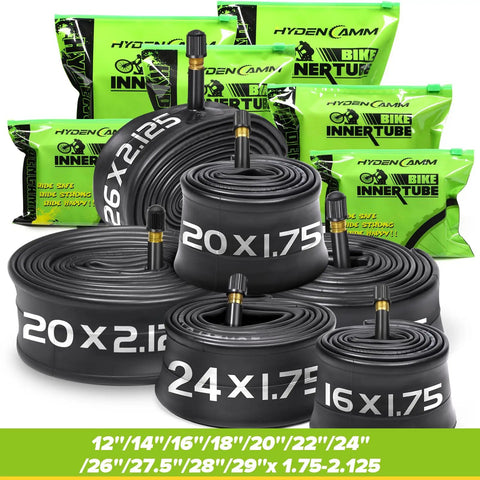 Assorted bike inner tubes with 35mm Schrader valves in various sizes, including Dual Pack 26x2.125 To 2.40 Inches with tire levers.