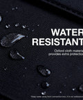 Close-up of water droplets on black Oxford cloth showing water resistance for the 60 Watt Foldable Solar Panel Charger. Leave The Cord Hustle Behind With This 60 Watt Foldable Solar Panel Charger Ideal For Tailgates Campouts And Emergency Backup Features Usb C Dual Usb A And Dc Outputs To Keep Your Portable Power Banks Running Smooth.