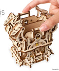 3D Puzzle Deck Box For Card Games That Holds Up To 120 Cards, Wooden Mechanical Kit For Adults, Perfect For Family Game Night And Tabletop RPGs, Easy To Assemble Storage Solution You Can Show Off, wooden deck box opened by hand