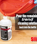 Pouring cleaning solution into Trend bottle from Deluxe Saw Blade Cleaning Kit With Silicone Tray And 18oz Spray Cleaner Includes Trend Tool And Bit Cleaner Fulton Wire Brush Set And All In One Blade Care For Rust Removal And Mess Free Maintenance Up To 12 Inches Pro Grade.