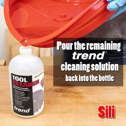 Pouring cleaning solution into Trend bottle from Deluxe Saw Blade Cleaning Kit With Silicone Tray And 18oz Spray Cleaner Includes Trend Tool And Bit Cleaner Fulton Wire Brush Set And All In One Blade Care For Rust Removal And Mess Free Maintenance Up To 12 Inches Pro Grade.