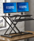 Epic Height Adjustable Sit To Stand Desk Converter For Dual Monitors And Laptop With A 31.5 Inch Wide Top Surface on wooden desk