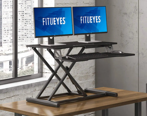 Epic Height Adjustable Sit To Stand Desk Converter For Dual Monitors And Laptop With A 31.5 Inch Wide Top Surface on wooden desk