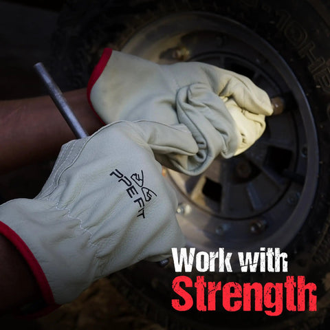 Badass 12 Pair Leather Work Gloves Built Like A Tank Deliver Heavy Duty Non Slip Grip For Grinding Construction Jobs Rugged Yard Labor And Warehouse Shifts Large Fit, hands tightening a nut on a tire.