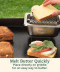 Stainless Steel Butter Wheel For Griddles And Grills Raised Bottom Butter Roller in use, melting butter on bread for easy BBQ grilling