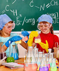 Children in lab coats using Nine Piece Glass Erlenmeyer Flask Set With Stirring Rods, 7 Sizes From 50ml To 500ml for science experiment.