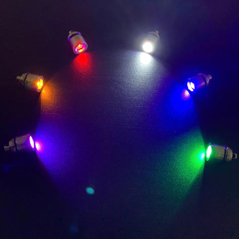 50 Pack Mini LED Lights Kit For Crafts and Dollhouses RGB color changing in rainbow pattern on black surface