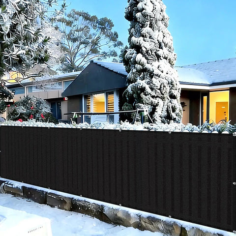 Black 3x16 Balcony Privacy Screen Made From HDPE UV Protected Fence Mesh Shade Net Cover in snowy garden setting