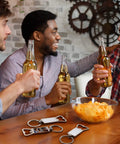 Men enjoying drinks around table with 20 Pack Sublimation Keychain Blanks With Bottle Opener Dope Aluminum Rectangle Metal Key Rings