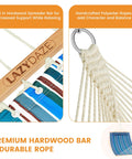 Close-up of 12 Ft Quilted Double Hammock With Spreader Bars And Detachable Pillow, showing hardwood bar and polyester ropes