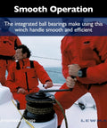 Sailor using 8 Inch Aluminum Winch Handle With Ball Bearings For Smooth Cranking on boat deck in marine setting.