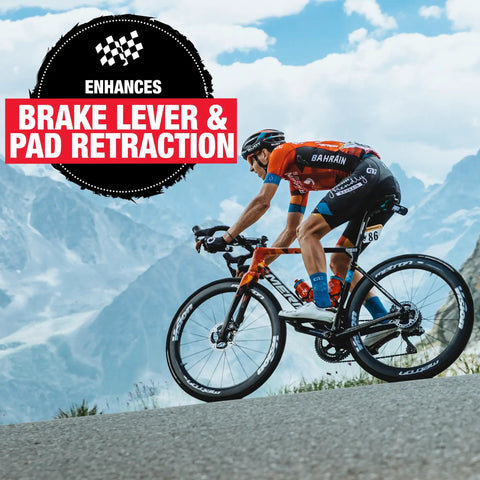 Cyclist using Mineral Oil Bicycle Brake Fluid For Hydraulic Disc Brakes With Low Viscosity For Smooth Lever Feel Quick Pad Return