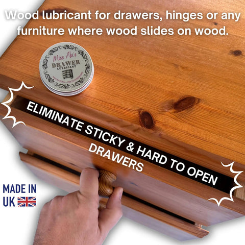 Heavy Duty Wood Drawer Wax And Premium Slide Lubricant That Gets Stubborn Cabinets Rolling Like Butter shown on wooden drawer.