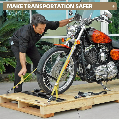 Man securing motorcycle with straps and Four Pack E Track Wheel Chocks For Enclosed Trailers And Garages on wooden platform.