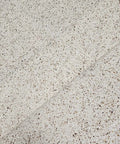 Top Shelf Cream Off White Textured Stone Wallpaper With Real Natural Mica And Subtle Gold Shimmer close-up of surface texture