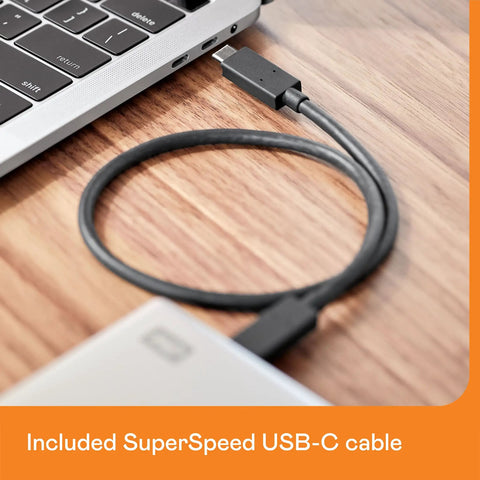 5TB My Passport Ultra For Mac Portable External Hard Drive With USB C And USB 3.1 connected via USB-C cable to laptop