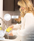 Clear Acrylic Lazy Susan Turntable With Four Removable Sections And Easy Grip Handles Smooth 360 Rotation For Kitchen Fridge And Cabinet Zero Stress Storage That Keeps Your Pantry Spice Stash And Cosmetics Looking Sharp Daily being cleaned in a sink.