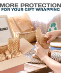 Person using Eco Friendly Honeycomb Packing Paper Cushioned For Shipping And Moving Replaces Plastic Bubble Wrap Sustainable Paper With Self Dispenser Box White 12 Inch By 300 Feet