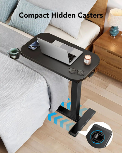 32 Inch On Wheels Overbed Desk With Cup Holder And Height Adjustable Pneumatic Lift Rolling Computer Cart next to bed