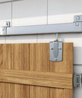 Premium 24ft Heavy Duty Galvanized Steel Exterior Sliding Barn Door Hardware Kit Featuring Rust Free Track Rollers on wood barn door.