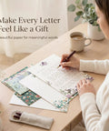 Person writing on Cute 66-Piece Stationery Kit With Envelopes No-Bleed Lined Paper Floral Designs For Beautiful Handwritten Notes Totally Giftable For Women