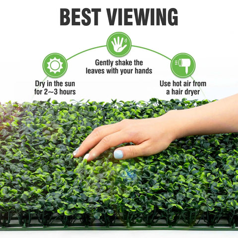 Hand touching 24 Pack 20x20 Grass Wall Panels Artificial Boxwood For Greenery Wall Backdrop Indoor Outdoor Decor Garden Fence Privacy Screen Wedding Backdrop 66 Sq Ft Coverage