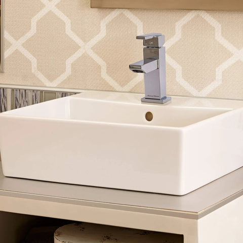 Times Square Single Handle Monoblock Faucet In Polished Chrome with Ceramic Disc Valve on bathroom sink