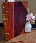 Leather-bound reference manual for Direct Support And General Support Maintenance Repair Parts And Special Tools List for auger system.