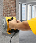 Heavy Duty Electric Wall Planer And Tough Concrete Scraper With A Ripping Tungsten Steel Blade in use, smoothing wall surface.