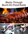 Giddy Up Grill Cleaner Cordless BBQ Scrubber with 350 RPM Stainless Roller cleaning a flaming grill with ribs.