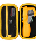 Aproca yellow case, interior view with orange infrared thermometer and mesh accessory pockets.