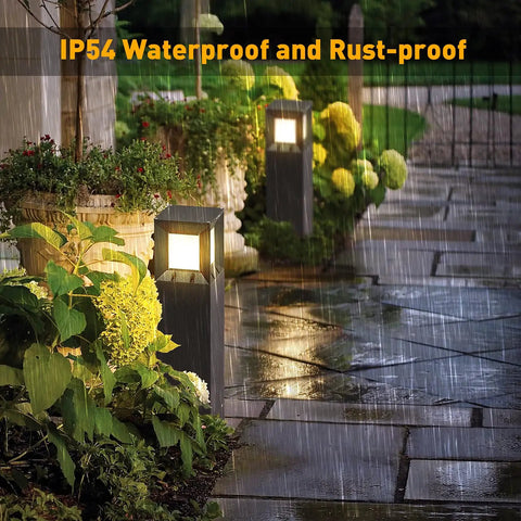 Go-To IP54 Waterproof Outdoor Bollard Path Light, 32-Inch Black LED Lamp, 3000K Warm White on wet patio pathway