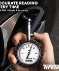 Car tire pressure gauge with analog dial, white face marked psi, chrome nozzle, TireTek logo