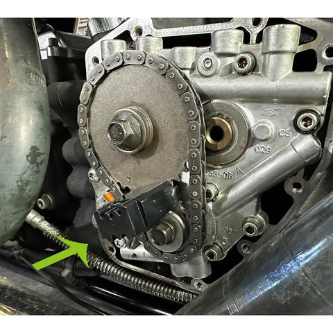 Mofun double-headed cam locking tool installed on Harley Twin Cam engine, timing chain visible