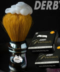 Shaving brush with lather beside Premium Single Edge Razor Blades With Ultra Sharp Chromium Ceramic Platinum Tungsten And Polymer
