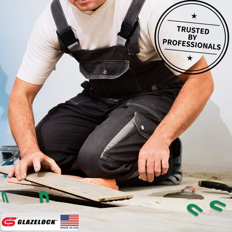 Worker using Workhorse Plastic Horseshoe Shim Multipack For Leveling Windows Doors Cabinets 100 Piece Set Includes One Quarter Inch One Eighth Inch One Sixteenth Inch And One Thirty Second Inch U Shape Tile Shims Spacers For Indoor Outdoor Use Made In USA