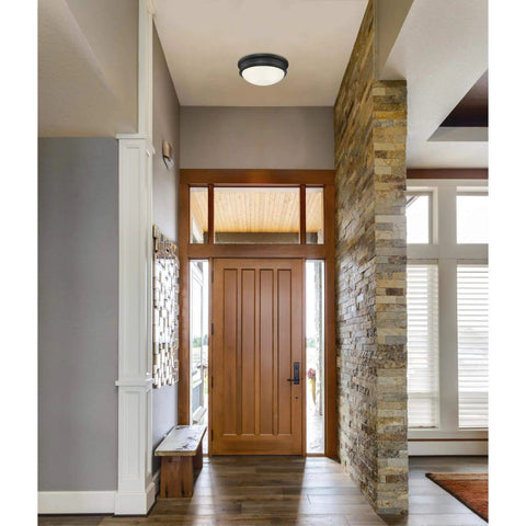 Meadowbrook Two Light Indoor Flush Mount Ceiling Fixture In Matte Black With Frosted Glass Dome in an entryway