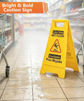 No Sweat Heavy Duty Commercial Mop Bucket On Wheels With Side Press Wringer And 35 Quart Size For Knocking Out Floor Cleanup Fast At Hotel Or Bank Sites Today with yellow caution sign on wet floor.