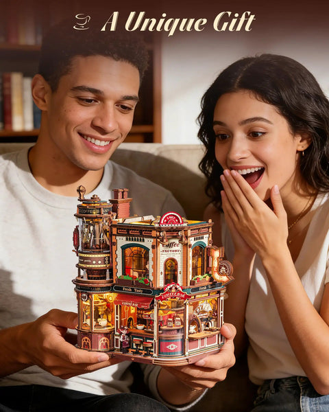 Two people admiring Dream Coffee Factory Mechanical 3D Wooden Puzzle Kit With Moving LED Lights for Adults, detailed coffee shop scene.
