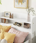 Close-up of white finish Pine Wood Bed With Bookcase Headboard And LED Motion Sensor Light Built In Guardrails