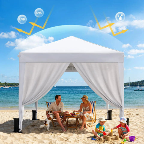 Easy Up 10x10 Pop Up Canopy With Sidewalls One Push Instant Setup In A Snap on a beach, providing shade for family activities.