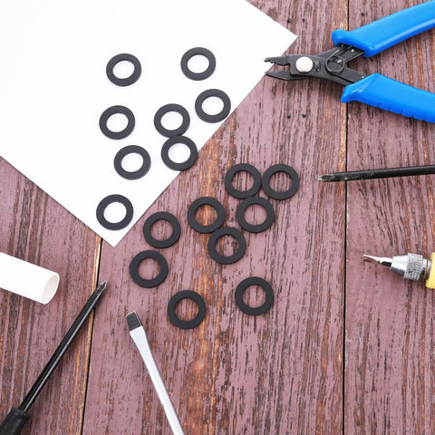 Rubber Washers For Hose And Shower Head Half Inch Seal Kit 24 Pack 19Mm OD 11Mm ID 2Mm Thick Leak Proof Seals on wooden surface