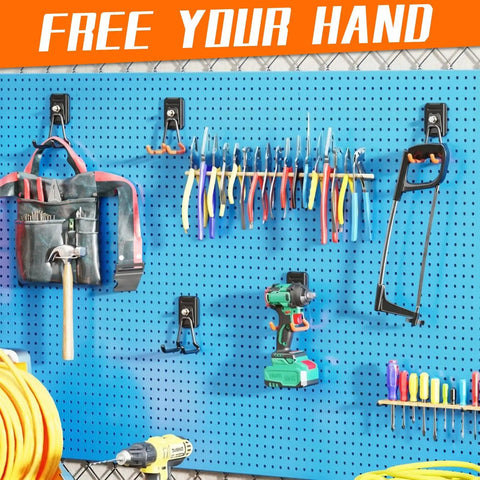 Installed Heavy Duty Magnetic Garage Hooks 4 Pack Beefy Magnet Hangers for tools on a blue pegboard in a workshop.
