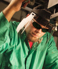 Worker wearing Hellraiser IRUV Shade 3.0 Safety Glasses with black frame for infrared and ultraviolet protection during cutting task.